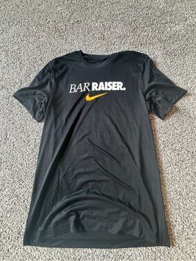Nike Black Short-Sleeve 'BAR RAISER' Tee with Gold Swoosh
